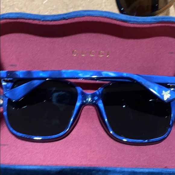 Blue Gucci fun and glasses. main image 7